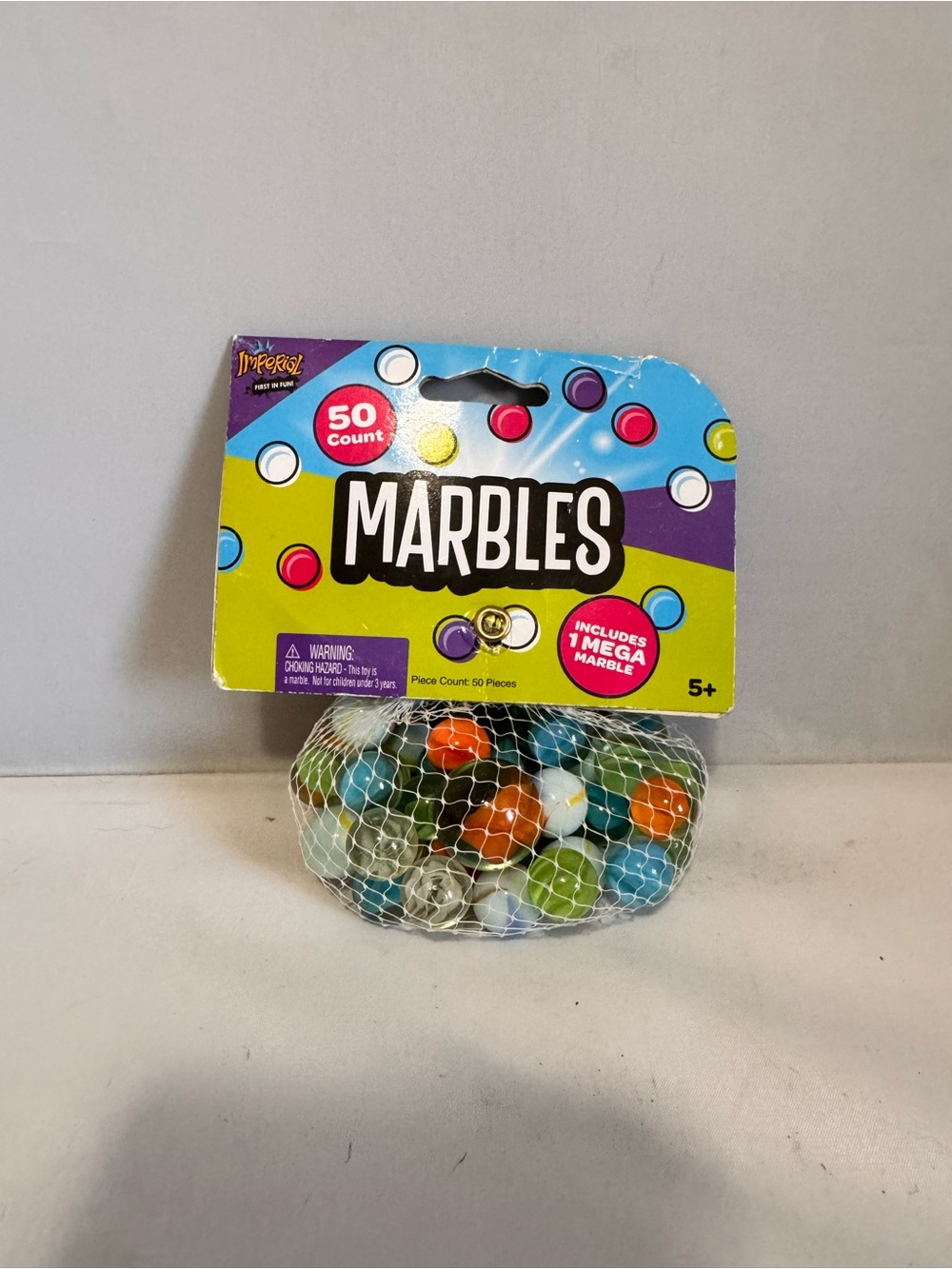 Imperial Toy Glass MARBLES 50-Count Pack with Mega Marble - Multicolor